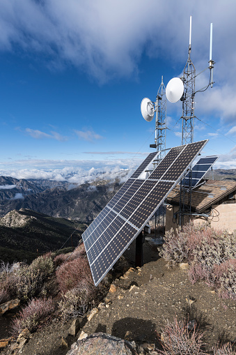 Vertical view of solar communication towers on Josephine Peak in the San Gabriel Mountains and Angeles National Forest in Southern California.