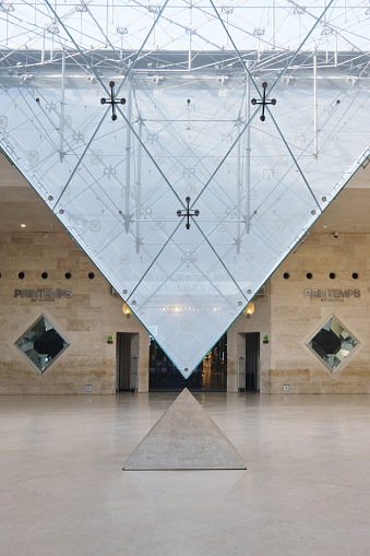 Paris, France - May, 2022: Reverse glass pyramid installation in Louvre Palace