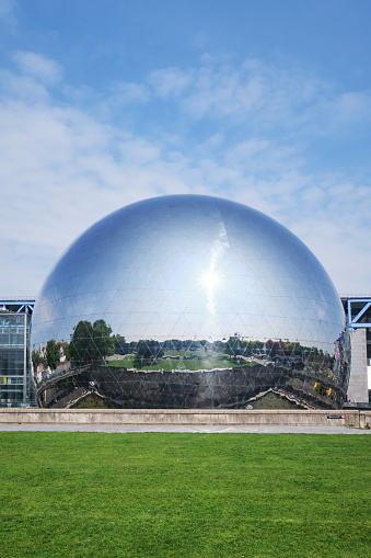 Paris, France - May, 2022: La Geode in the Parc de la Villette. mirror geodesic dome Omnimax theatre at the Cite des Sciences et de l Industrie