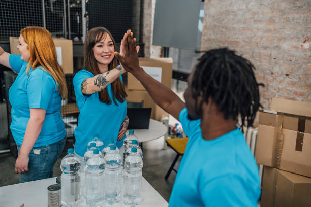 istock Teamwork in the charity donation center 1456460354