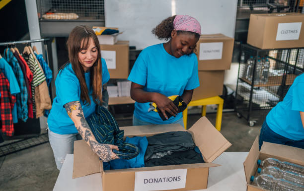 istock Volunteers in charity donations center 1456462105