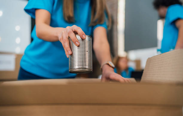 istock Volunteers in charity donations center 1456462481