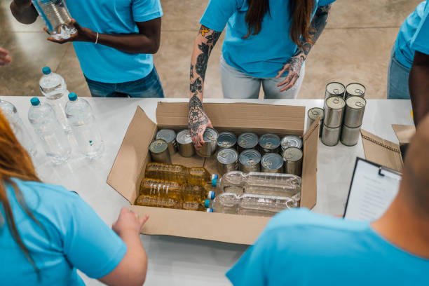 istock Volunteers in charity donations center 1456463667