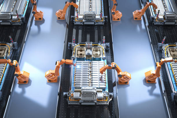 istock Robot assembly line with electric car battery cells module on platform 1456466947