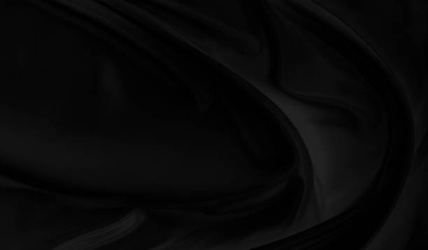 istock Black gray satin dark fabric texture luxurious shiny that is abstract silk cloth background with patterns soft waves blur beautiful. 1456467283