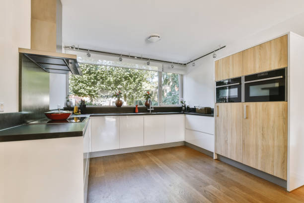 istock Interior of modern kitchen with white furniture 1456468236