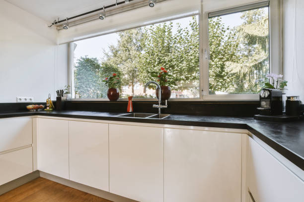istock Interior of modern kitchen with white furniture 1456468824