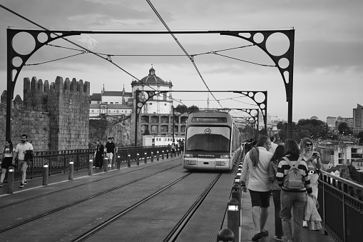 Porto, Portugal- July 5,2022; Beautiful modern tram system in Porto, Portugal shot in black and white. d