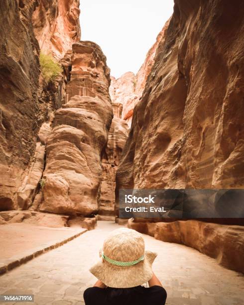 Tourist In Petra Take Photograph Of The Siq The Narrow Slotcanyon That Serves As The Entrance Passage To The Hidden City Of Petra Sightseeing Destination Of Jordan Stock Photo - Download Image Now