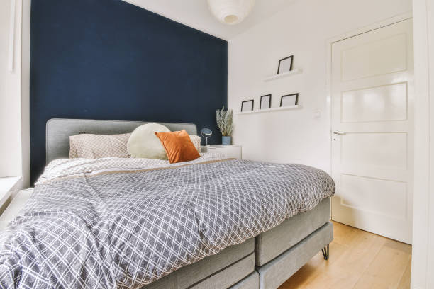 istock Light bedroom with wooden wardrobe 1456472337