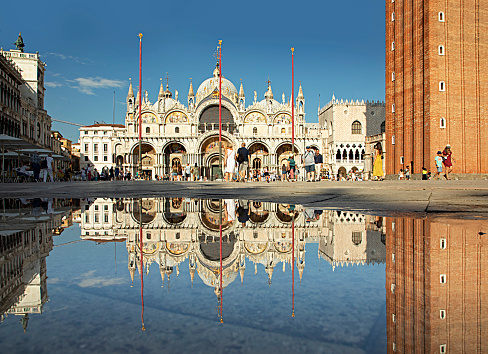 Venice, Italy - July 2, 2021: reflection of cathedral san Marco at san Marco square in Venice, Italy