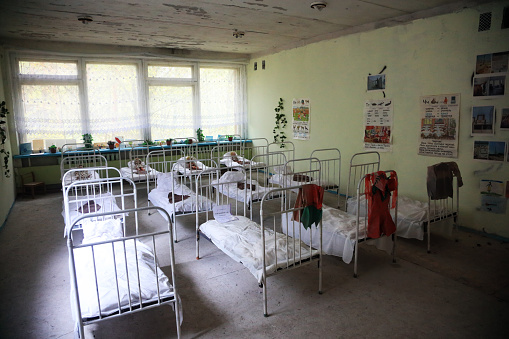 A bedroom in a kindergarten in the abandoned city of Pripyat, after the accident at the Chernobyl nuclear power plant. Pripyat, Ukraine.