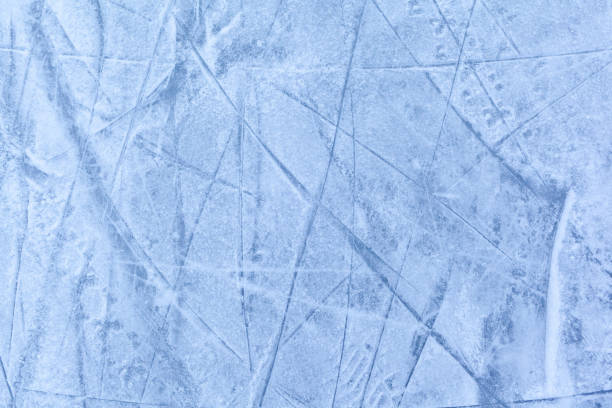 istock Empty ice rink with skate marks after the session outdoor. 1456486480