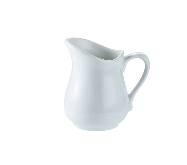 istock Ceramic milk jar isolated on white background. Porcelain creamer pitcher with milk on white. 1456491252