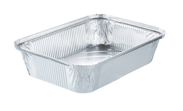 rectangular shape of the foil for food isolated.
Aluminum utensils for baking isolated. stock photo
