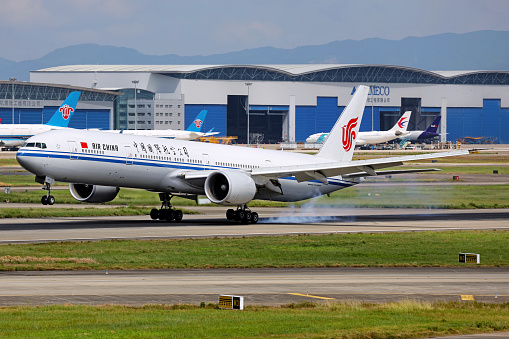 A Boeing 777 aircraft operated by Air China lands in Guangzhou airport