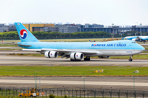 A Boeing 747 freighter aircraft operated by Korean Air Cargo lands in Guangzhou Baiyun airport