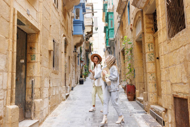 istock Happy travelers in old Mediterranean town 1456499393