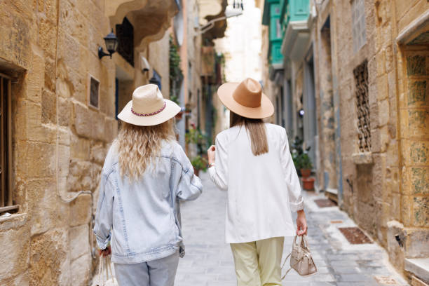 istock Happy travelers in old Mediterranean town 1456499604