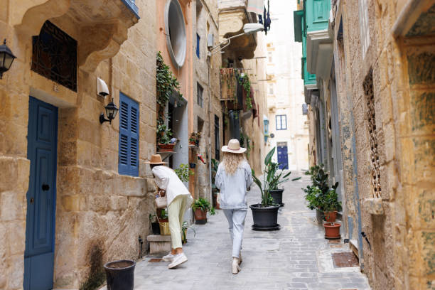 istock Happy travelers in old Mediterranean town 1456500194