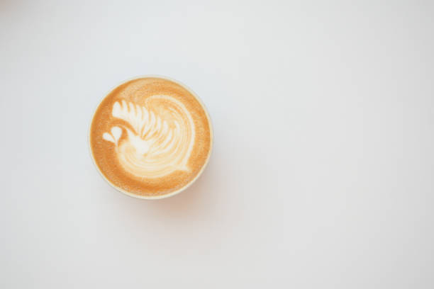 istock a cup of late coffee with flower shape design on top at cafe 1456500237