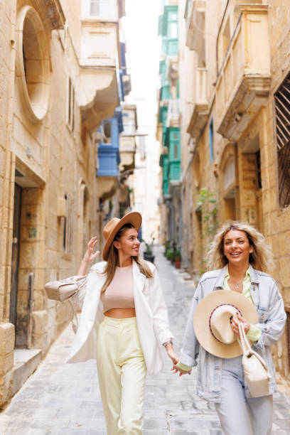 istock Happy travelers in old Mediterranean town 1456500359
