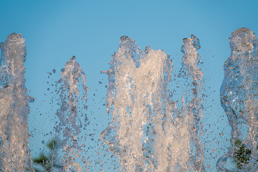Spraying water in a fountain background