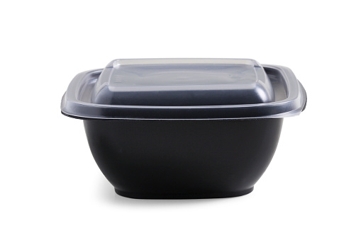 Disposable plastic food container with lid isolated on white