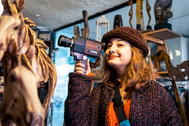 istock A young woman buying an old camera 1456508008