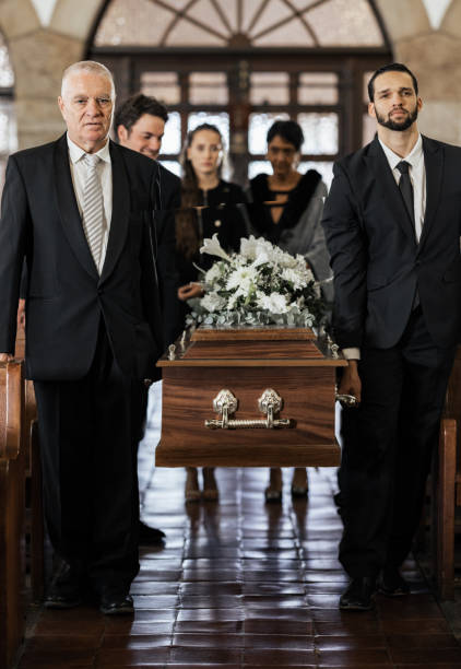 funeral, church and family carry coffin for death, grief or sermon for burial with support. people, pallbearers and sad together with casket for respect, farewell or sorrow in mourning, mass or loss - funeral family sadness depression imagens e fotografias de stock