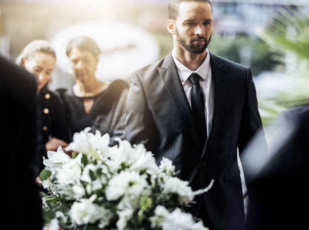 death, funeral and carry coffin with family mourning, sad and depressed for grieving time. grief together, mental health and man holding casket for church service, memorial and difficult for loss. - funeral family sadness depression imagens e fotografias de stock