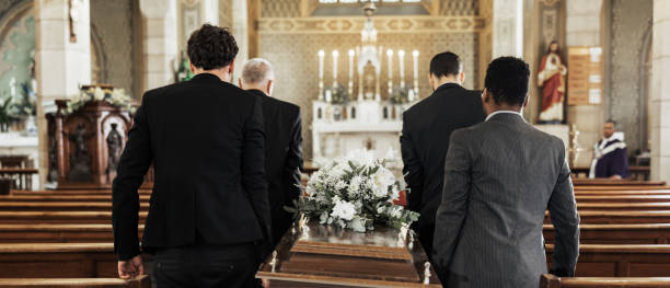 funeral, church and group carry coffin in service, death or sermon for burial with support. friends, family or pallbearers with casket for respect, help or sorrow in mourning, worship or god religion - funeral family sadness depression imagens e fotografias de stock
