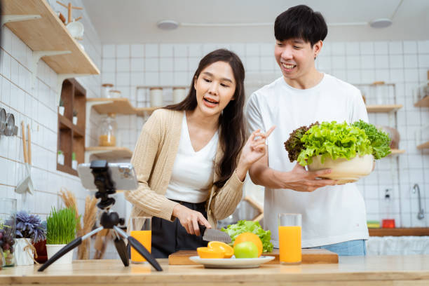 istock Couple making a cooking live steaming. 1456518171