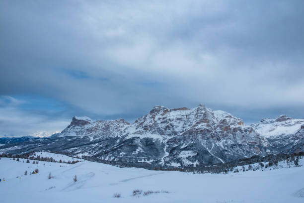 istock Stormy clouds in italian dolomites in a snowy winter 1456524805