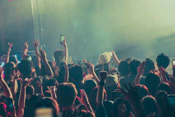 Music festival at night.  Many people enjoy the Music festival at night.  Special occasion.  New Year's Eve  Happy New Year.