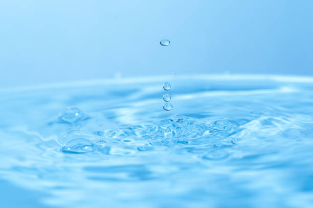 istock Water droplets popping on the surface of the water 1456531377