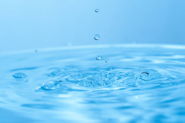 istock Water droplets popping on the surface of the water 1456531403