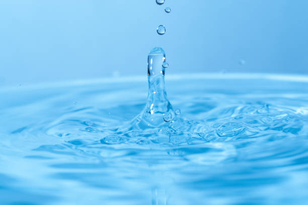 istock Water droplets popping on the surface of the water 1456531414