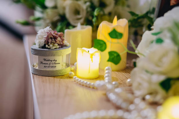 istock wedding souvenir next to candles on a wooden table 1456535956