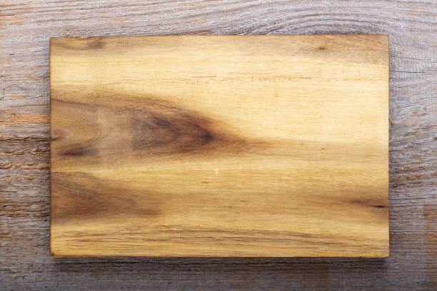 istock Chopping kitchen boards on a wooden background. Top view flat lay. 1456538599