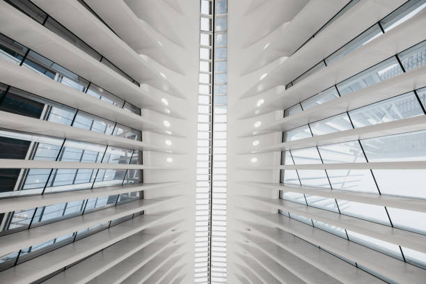 New York City, NY, United States - October 3rd, 2022: The Oculus - World Trade Center Transportation Hub and mall in New York. Interior wide angle view of the building, it connects subway and train systems in Lower Manhattan, New York. The Westfield World Trade Center has been opened to the public on August 16th 2016, it was built by the architect Santiago Calatrava.