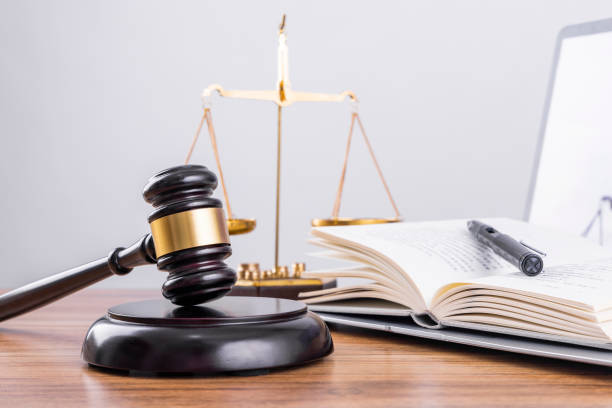 The scales and the judge's hammer on the table