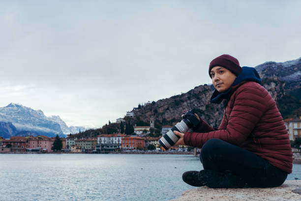 A photographer looks around the vicinity of Lake Garda stock photo
