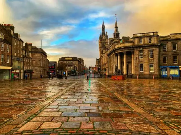 The Castlegate at the top end of Union Street in Aberdeen, Scotland during the rain.