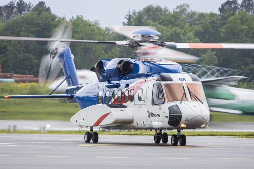 Bergen, Norway - June 13, 2022: A Bristow Helicopters Sikorsky S-61N on the ramp at Bergen airport in Norway
