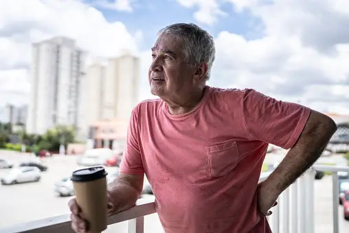 Contemplative senior man looking away outdoors