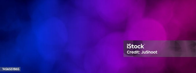 istock Abstract blue and pink modern background banner with bokeh lights effect in the dark 1456551865
