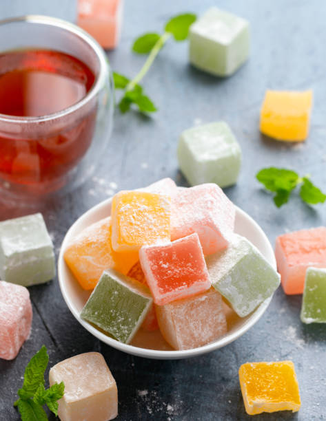 istock Sweets turkish delights with glass of tea 1456552239