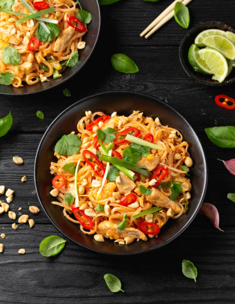 istock Chicken Pad Thai with eggs, bean sprouts, peanuts and spring onion 1456553282