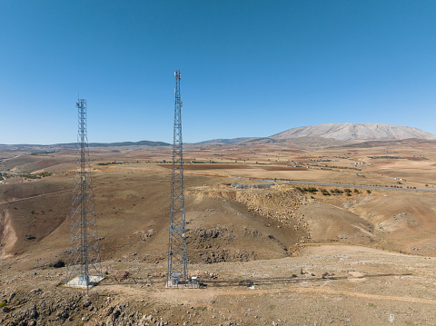 Communications Towers on field. Konya, Turkey. Taken via drone.